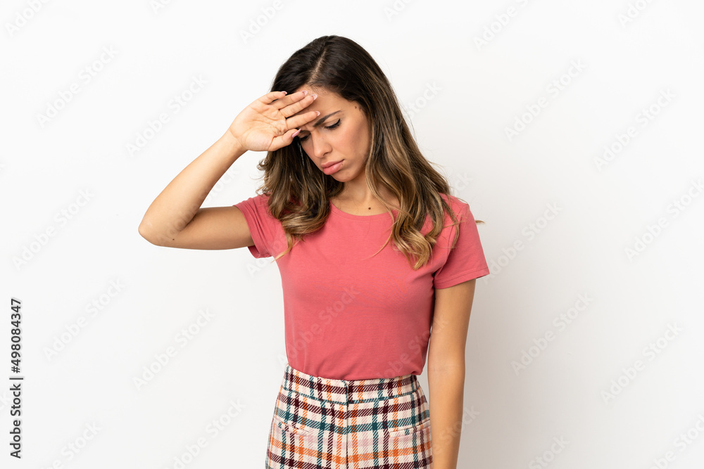 Young woman over isolated background with tired and sick expression Young woman over isolated background with tired and sick expression