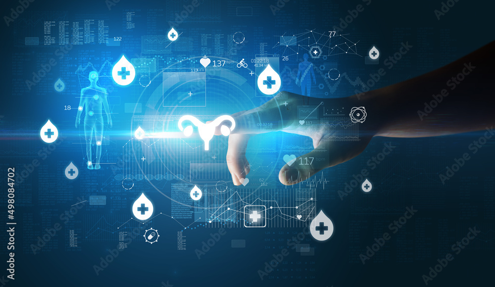 Doctor hand pressing futuristic health device with medical symbol on screen Doctor hand pressing futuristic health device with medical symbol on screen