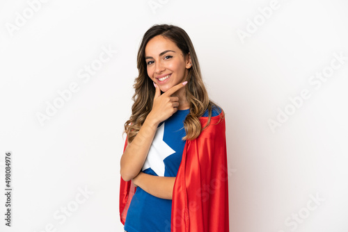 Super Hero woman over isolated white background smiling
