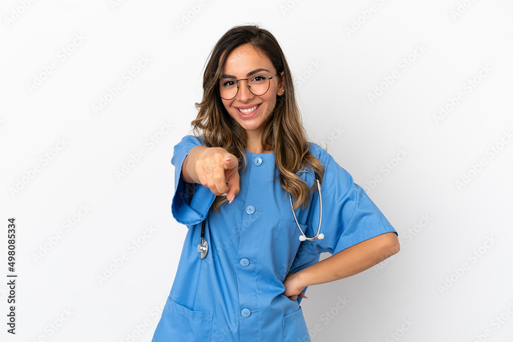 Young surgeon doctor woman over isolated white wall points finger at you with a confident expression Young surgeon doctor woman over isolated white wall points finger at you with a confident expression