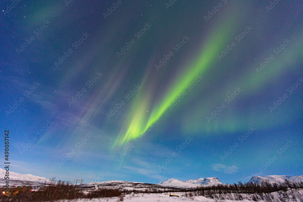 Abisko, Aurora Borealis in Lapland. Sweden lights in the sky full of stars.colors of the solar wind