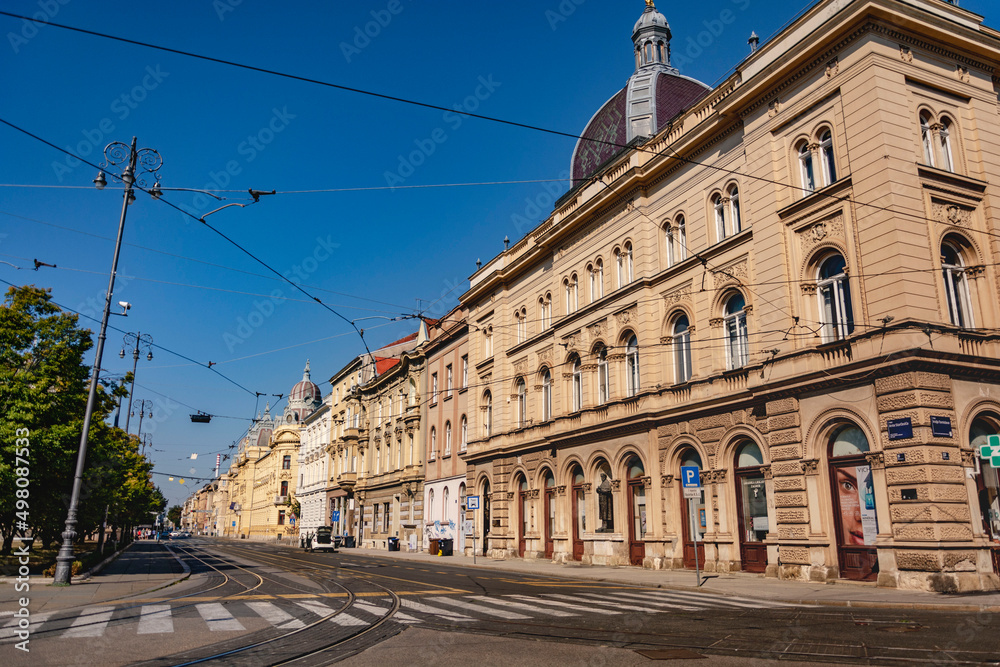 Empty street in the centre of Zagreb with transport lines in a sunny summer day