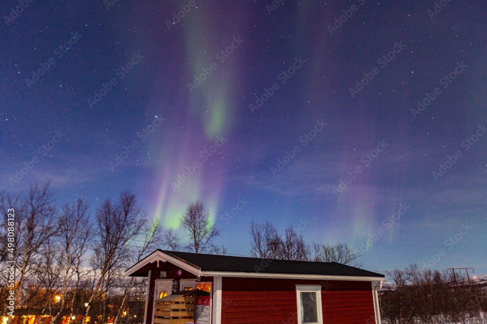 Abisko, Aurora Borealis in Lapland. Sweden lights in the sky full of stars. Land of the Sami people.
Solar wind colors