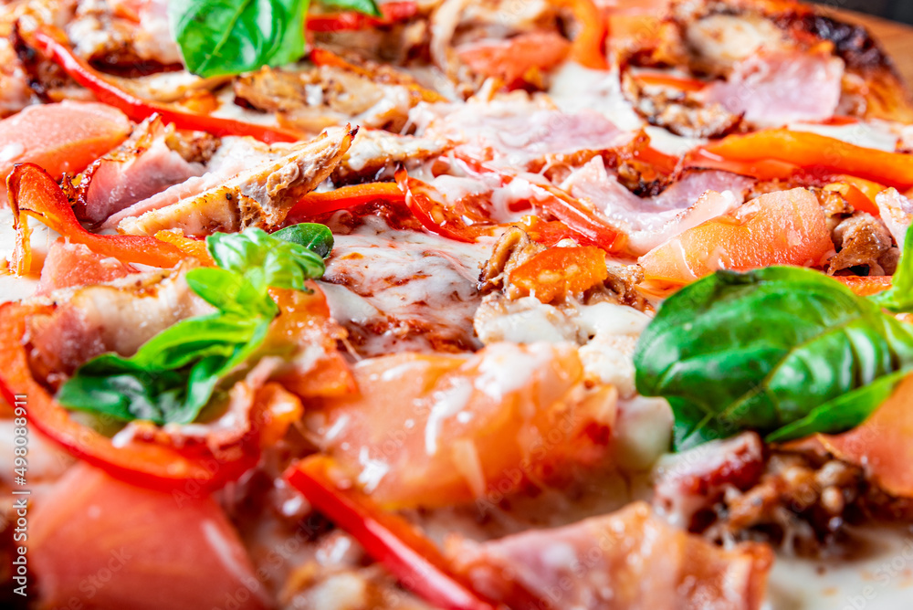 flatbread Pepperoni roman Pizza with Mozzarella cheese, chicken, ham, Tomato sauce, pepper, Spices. Italian pizza on wooden background flatbread Pepperoni roman Pizza with Mozzarella cheese, chicken, ham, Tomato sauce, pepper, Spices. Italian pizza on wooden background