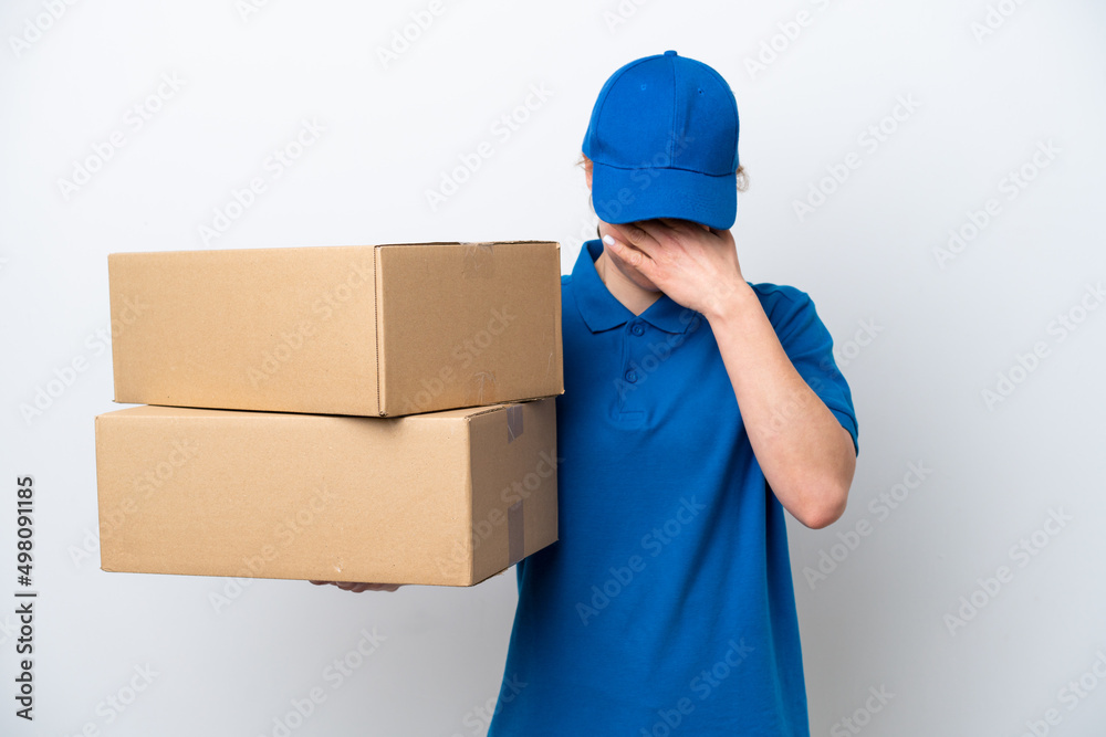 Delivery caucasian woman isolated on white background with tired and sick expression Delivery caucasian woman isolated on white background with tired and sick expression