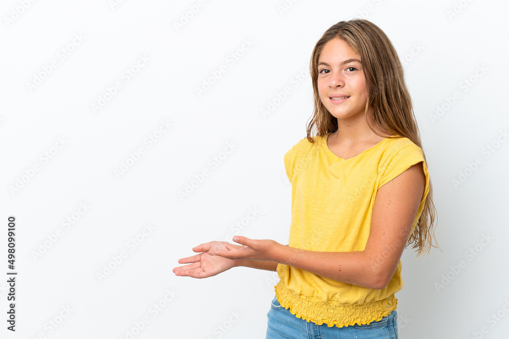 Little caucasian girl isolated on white background extending hands to the side for inviting to come