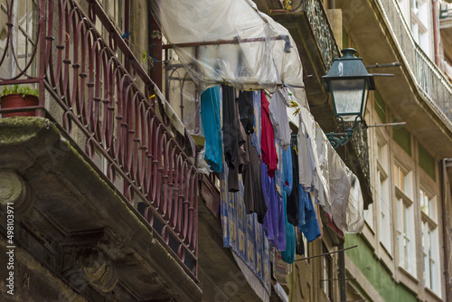 laundry on a balcony in an old street in Porto, Portugal photo