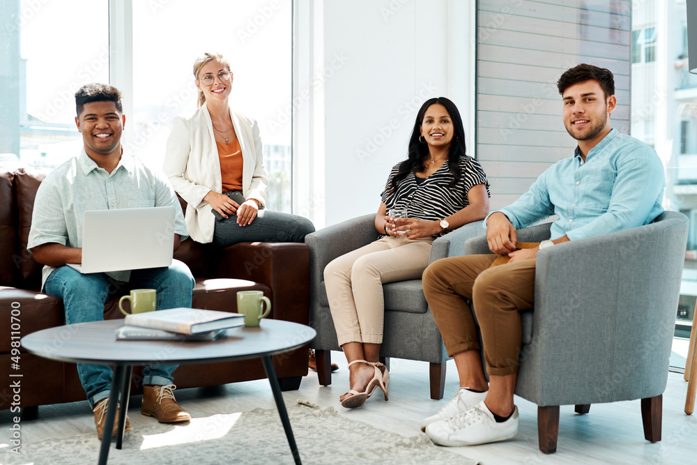 The team who know all about developing top ideas. Portrait of a group of businesspeople having a discussion in an office lounge. The team who know all about developing top ideas. Portrait of a group of businesspeople having a discussion in an office lounge.