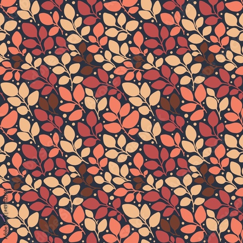 Stylish seamless pattern with pastel orange, yellow and red leaves on the dark background