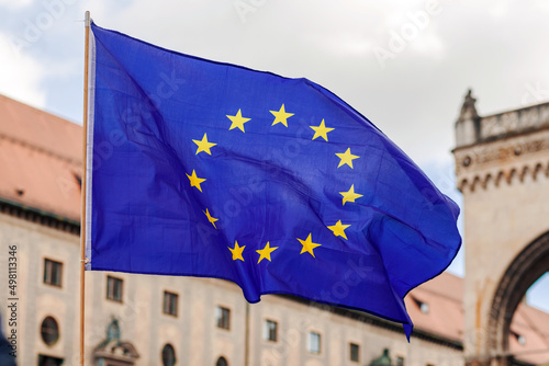 EU Flag -European Union flag blowing on Architecture Sky background