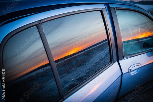 sunset reflection in the car window