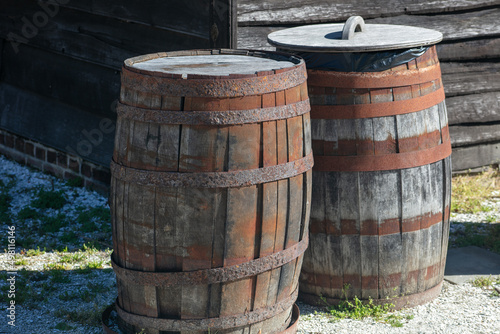 Vintage Wooden barrels Used as Trash Cans