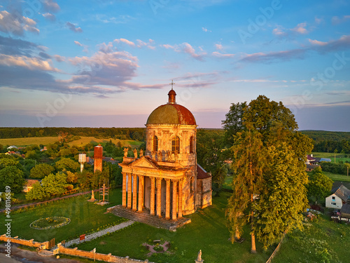 Obraz na płótnie Old St. Joseph's Church in Pidhirtsi aerial view, village Podgortsy, renaissance palace. Ukraine, Lviv region. w salonie