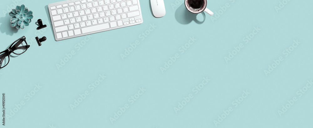 Computer keyboard with a cup of coffee and eyeglasses - flat lay - obrazy, fototapety, plakaty 