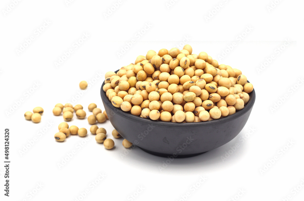 soybean seeds in a wooden bowl isolated on white background soybean seeds in a wooden bowl isolated on white background
