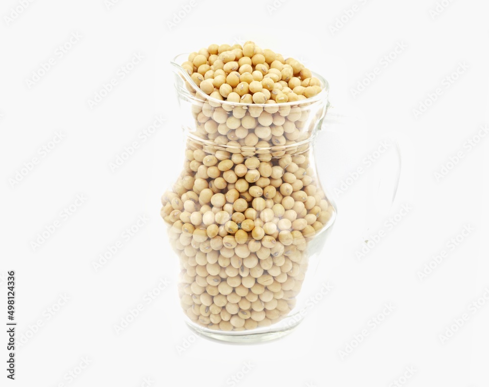 Close-up of soybean seeds in a clear glass jar isolated on white background Close-up of soybean seeds in a clear glass jar isolated on white background