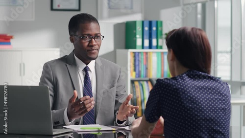 African-American executive have job interview with female applicant