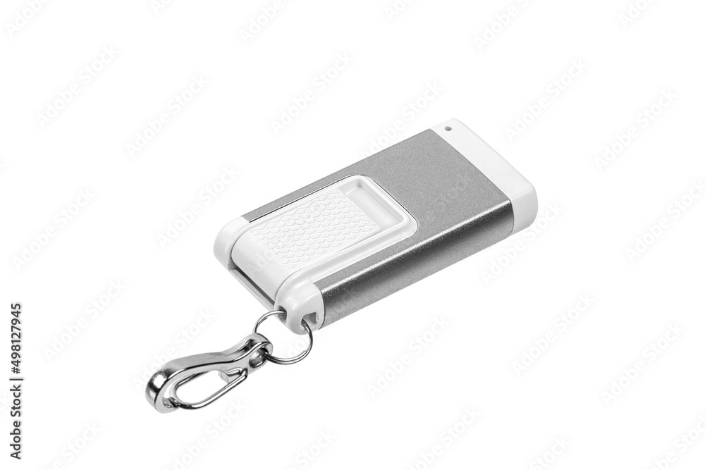 USB flashlight keychain.Metal LED flashlight isolate on a white back. Pocket lamp for dark time of day or dark rooms. USB flashlight keychain.Metal LED flashlight isolate on a white back. Pocket lamp for dark time of day or dark rooms.