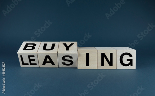Leasing vs buy. Cubes form the choice words leasing or buying. © Prazis Images