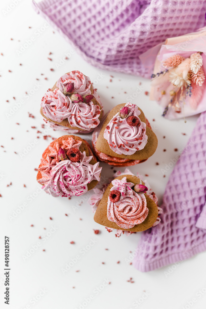 Pink cake marshmallow with raspberry and rose and purple towel Pink cake marshmallow with raspberry and rose and purple towel