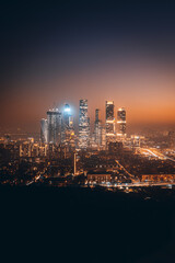 Poster Zwart Nachtelijke skyline vanuit vogelperspectief  © Andrey