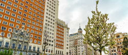 Neoclassical buildings of the city of Madrid on a cloudy day at dawn.