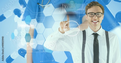 Data processing over caucasian man touching an invisible screen against mid section of health worker