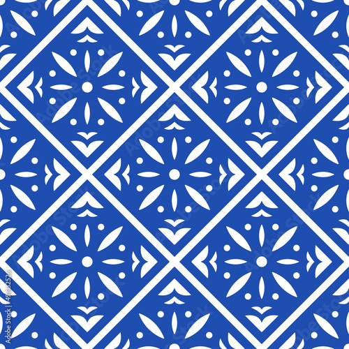 Blue floral squares and rhombuses isolated on white background. Cute monochrome geometric tiled seamless pattern. Vector simple flat graphic illustration. Texture.