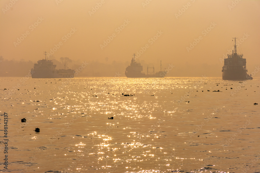 Large Sea, Ocean Carrier transport ships in the fog, Morning in the Pashur River, Mongla Port Bangladesh