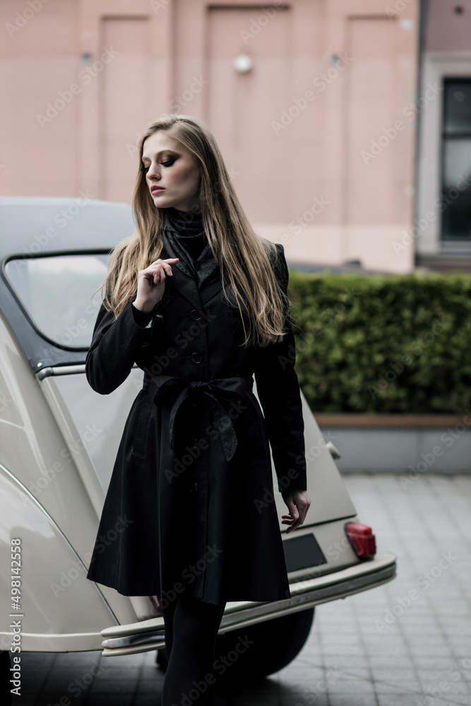 Fototapeta premium beautiful lady in black coat