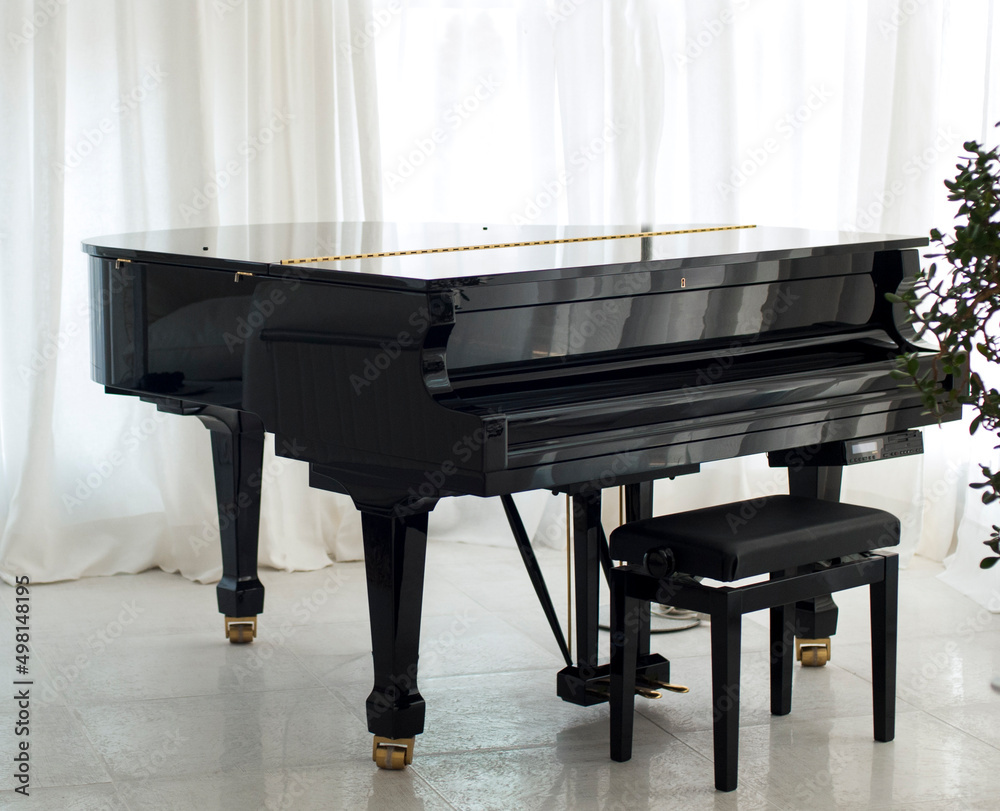 black grand piano on white background black grand piano on white background