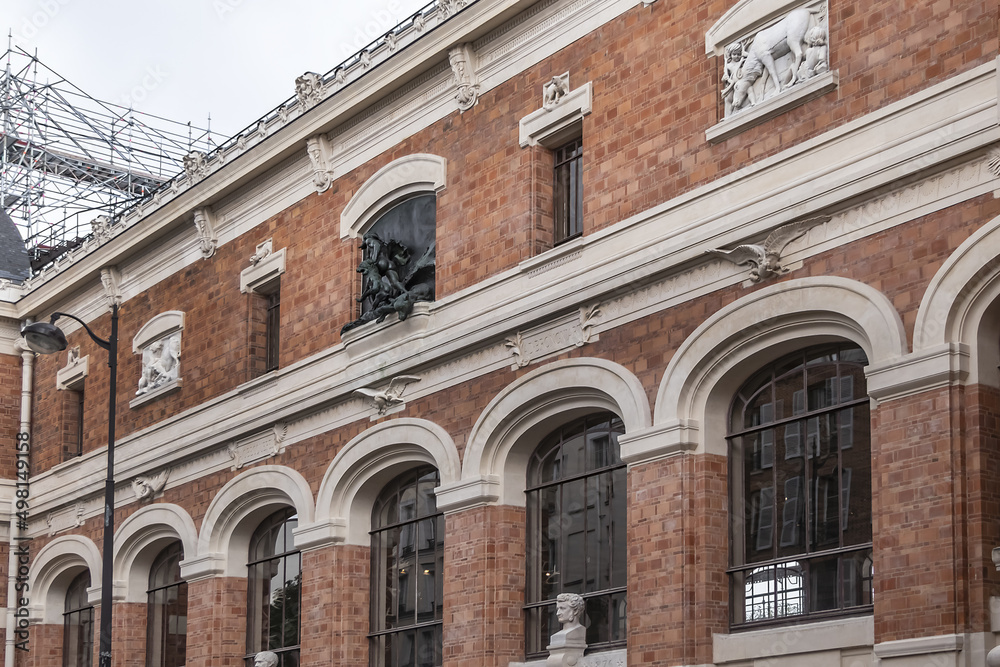 Architectural details of old Paris buildings: Gallery of Paleontology and Comparative Anatomy, built in 1897. Paris. France.