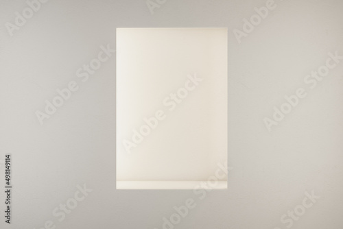 Blank white empty illuminated vertical rectangular niche in light wall with copyspace for your text. 3D rendering, mockup