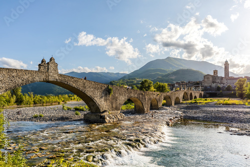 Fototapeta Naklejka Na Ścianę i Meble -  Panoramic view of The Hampback Bridge in Bobbio, Emilia Romagna region, Italy.