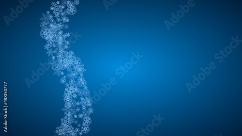 New Year snowflakes on blue background with sparkles. Horizontal Christmas and New Year snowflakes falling. For season sales, special offer, banners, cards, party invites, flyer. White frosty snow