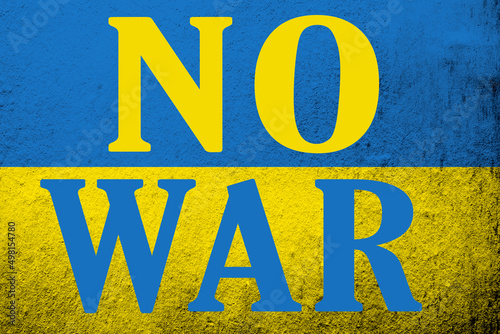 No war. Dirty Ukraine flag with anti war text. Grunge background