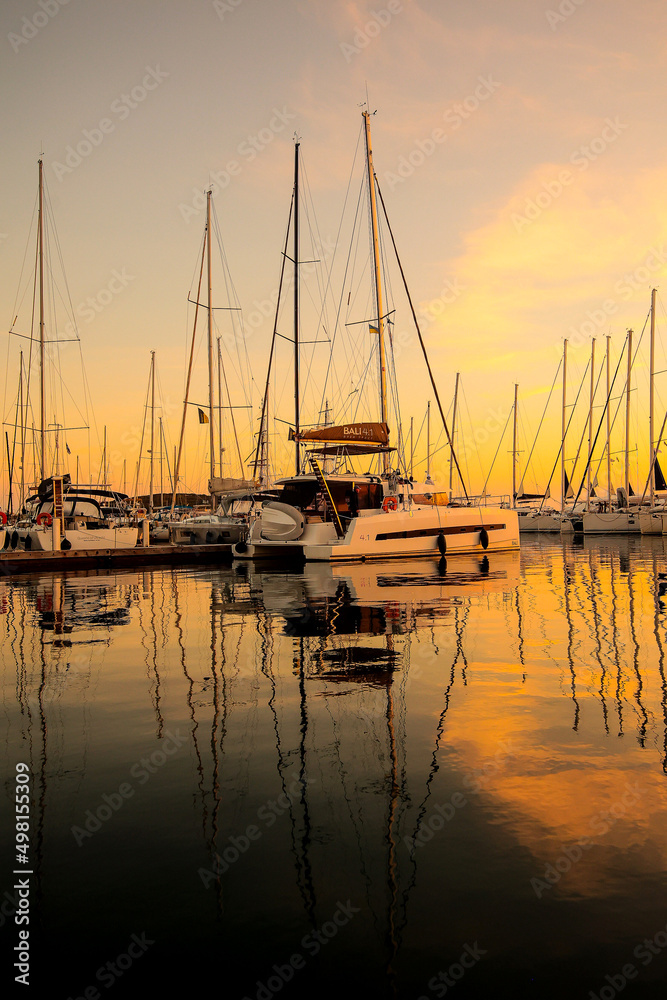 Yachts parking in harbor at sunset, Harbor yacht club in greece