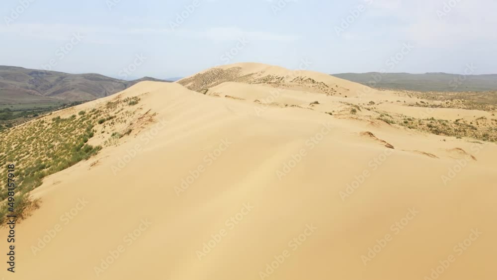 Sarykum is the largest sand dune in Europe. Dagestan nature reserve. Drone view Sarykum is the largest sand dune in Europe. Dagestan nature reserve. Drone view