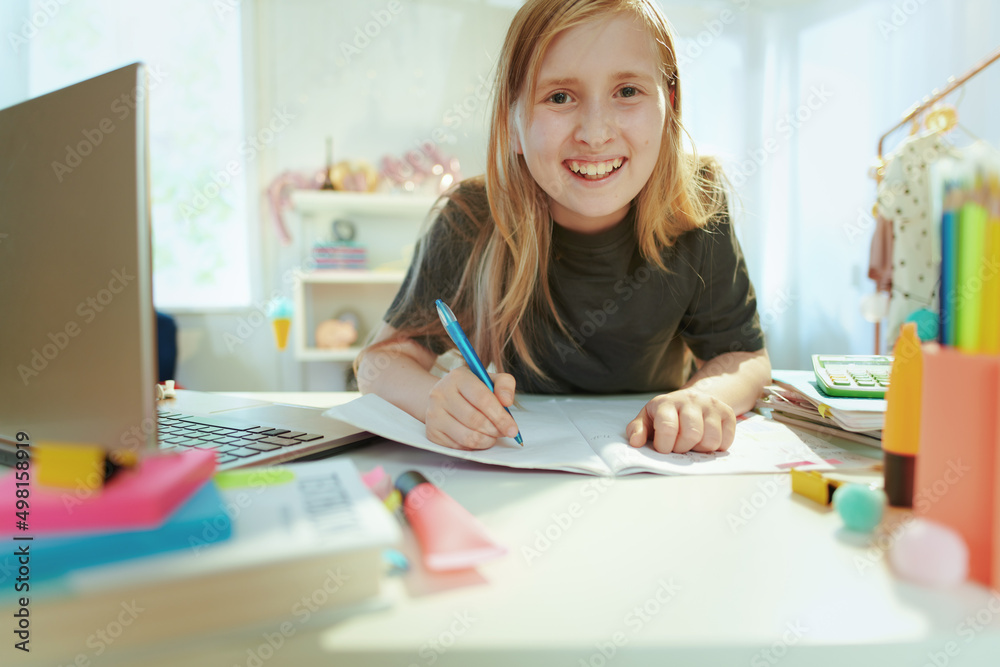 happy modern school girl distance learning at home in sunny day happy modern school girl distance learning at home in sunny day