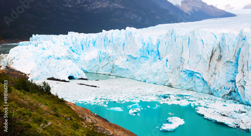 Glacier Perito Moreno (Glaciar Perito Moreno) and Andes mountains on sunny summer day. Patagonia, Argentina, Chile, Andes