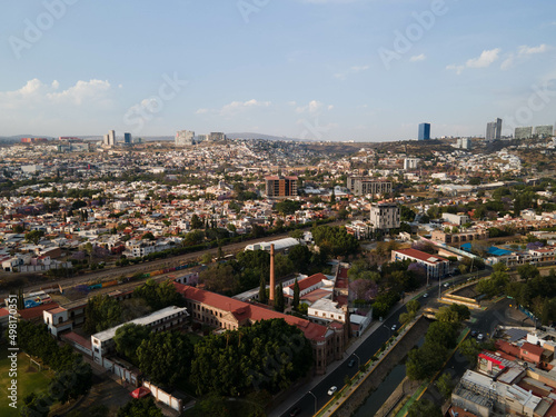 hermosa vista aerea de dron de el centro de queretaro mexico, drone clouds, city, colonial city, green grass, football filed