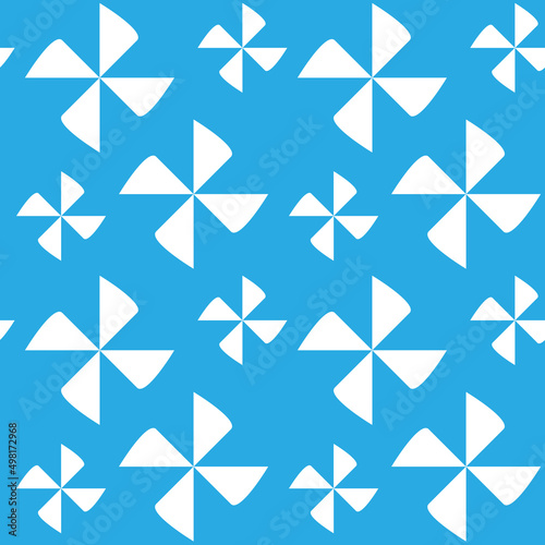 Abstract geometric seamless pattern. White flowers or windmills on blue background