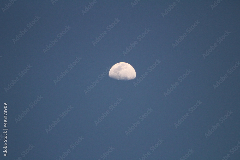 Half Moon With Clear Blue Sky Half Moon With Clear Blue Sky