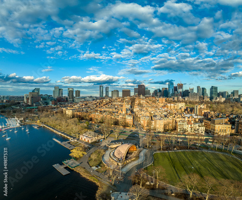 Aerial view of modern apartments and office buildings in downtown Boston with dramatic coludy sky