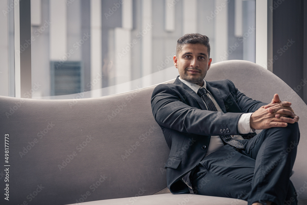 portrait of caucasian businessman in suit sitting in business workplace portrait of caucasian businessman in suit sitting in business workplace