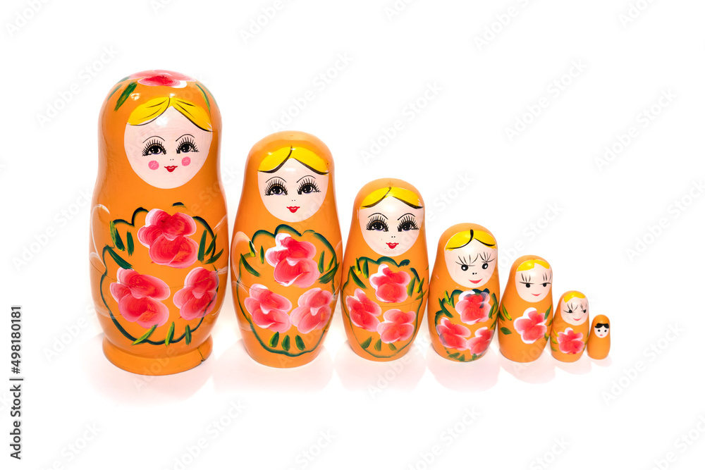 Colorful colored nesting dolls on a white background. Russian national souvenir