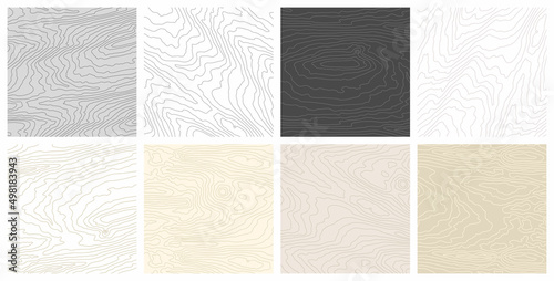 Wooden pattern. Wood grain texture. Dense lines. Light  background. Vector set 