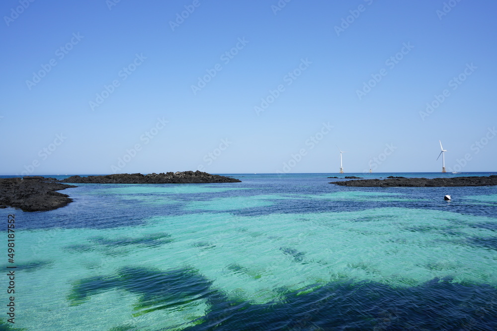 clear bluish sea and kayak