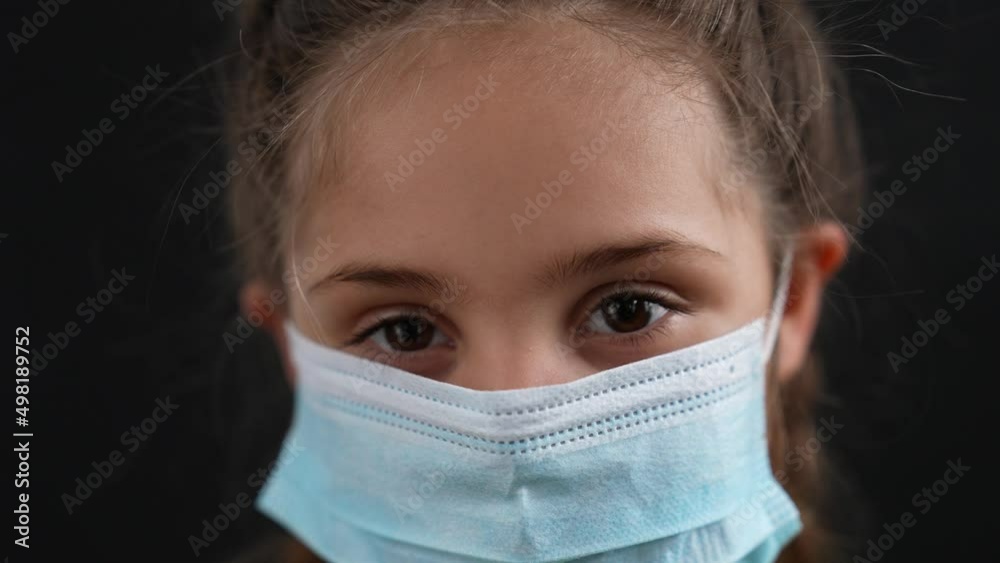 Girl in protective mask. Child face in safety mask. Prevention of diseases by virus. Portrait of girl in protective mask. Schoolgirl in medical mask. Close-up of child face. Fighting virus at school Girl in protective mask. Child face in safety mask. Prevention of diseases by virus. Portrait of girl in protective mask. Schoolgirl in medical mask. Close-up of child face. Fighting virus at school