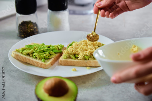 Woman preparing toasts with avocado, Healthy food and dieting concept, Organic product